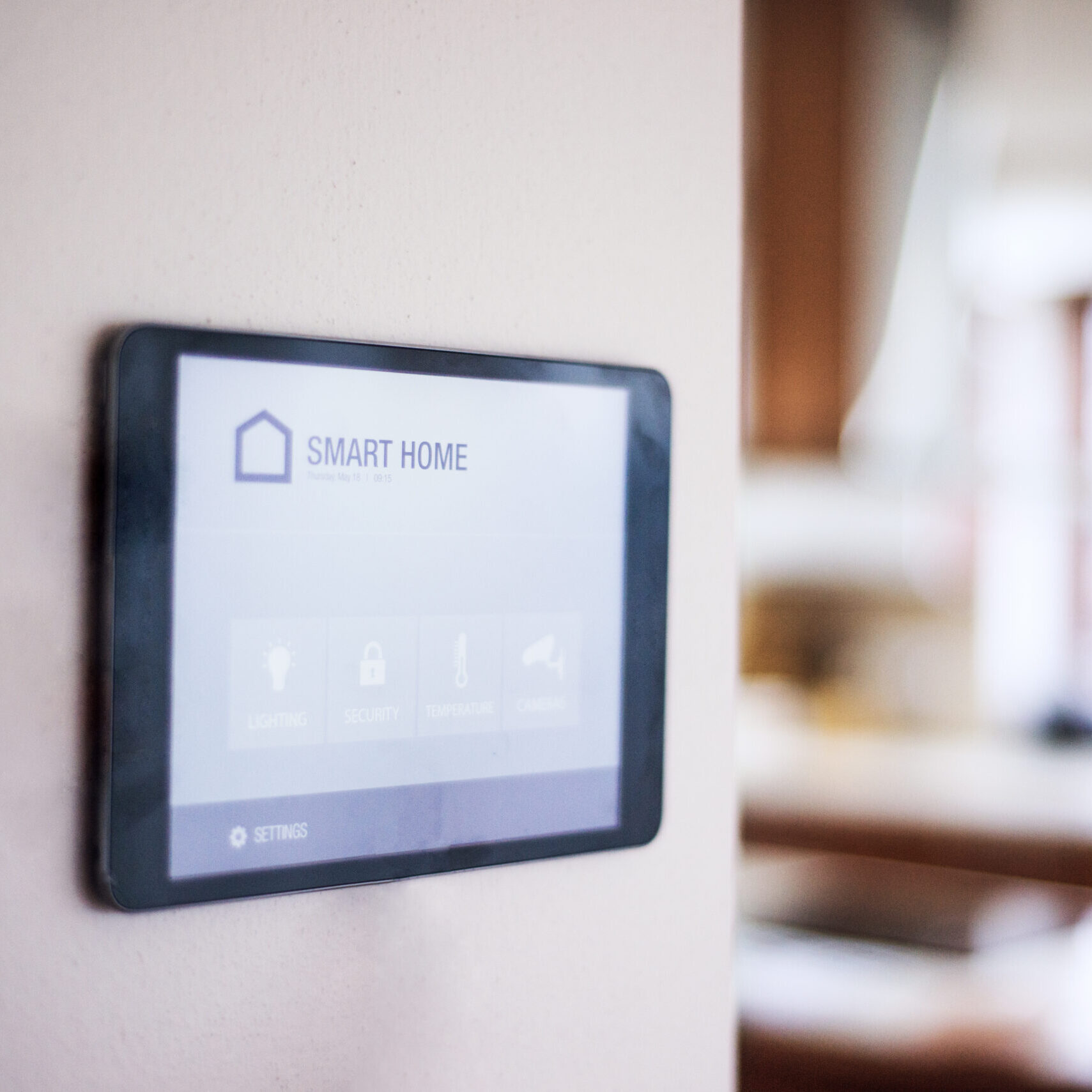 A tablet with smart home control system.